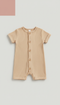 Warm Oat ribbed romper with wooden buttons